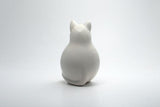 Katze sitzend weiss