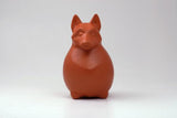 Hund sitzend rot